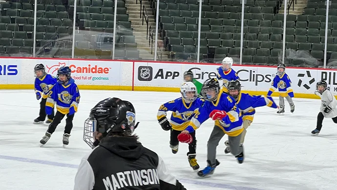 photo of hockey players at Hockey Kids4Kids Skate Night at Xcel Energy Center