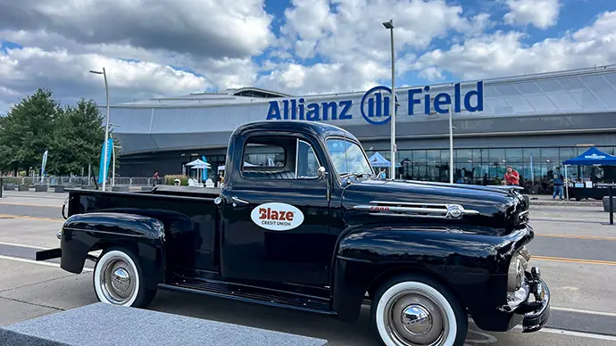 Blaze pickup truck, Archie, parked in front of Allianz Field where the Minnesota United FC play home games