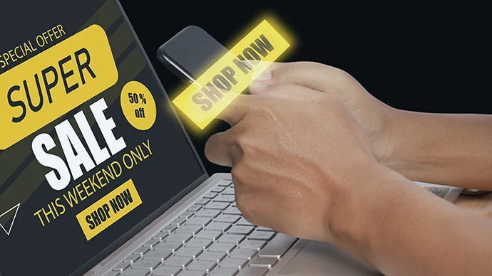 Tis the Season to Avoid Online Shopping Rip-offs Person shopping a holiday sale online